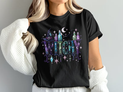 Black t-shirt with "WITCHY" text, hat, potions, cat, moon, and stars.