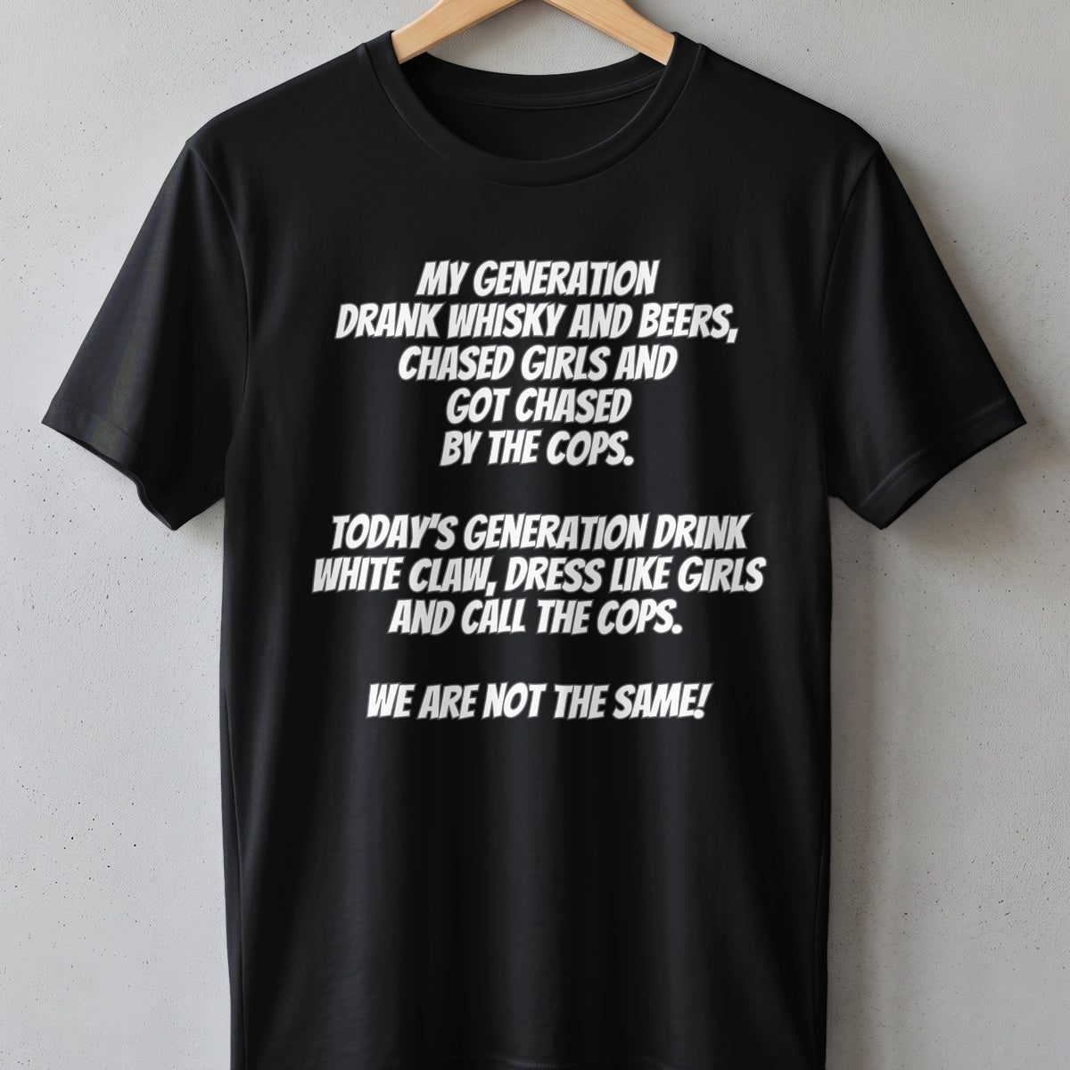 Black t-shirt with white text contrasting generations' behaviors and sayings.