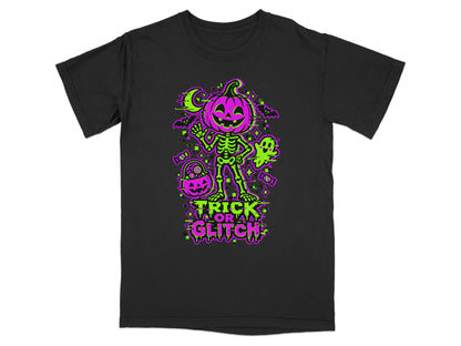 Black t-shirt with Halloween graphic featuring skeleton, pumpkin, ghost, bats, and text "TRICK OR GLITCH".
