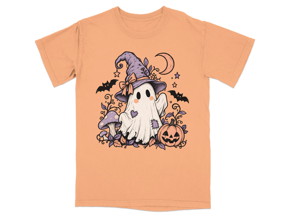 Orange t-shirt with a Halloween ghost wearing a witch hat, mushrooms, and a pumpkin.