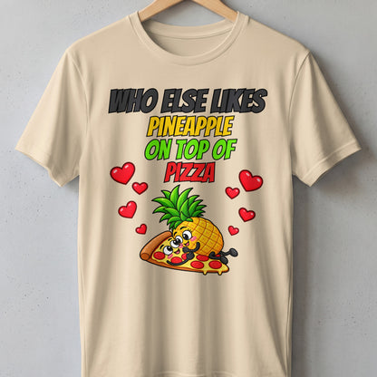 Cream t-shirt with "Who Else Likes Pineapple On Top Of Pizza" text and cartoon.