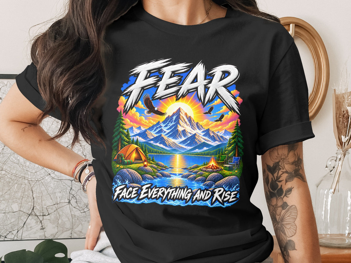 Black t-shirt with graphic "FEAR FACE EVERYTHING AND RISE" and mountain camping scene.