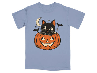 Black cat peeking out of a jack-o'-lantern with bats and moon.