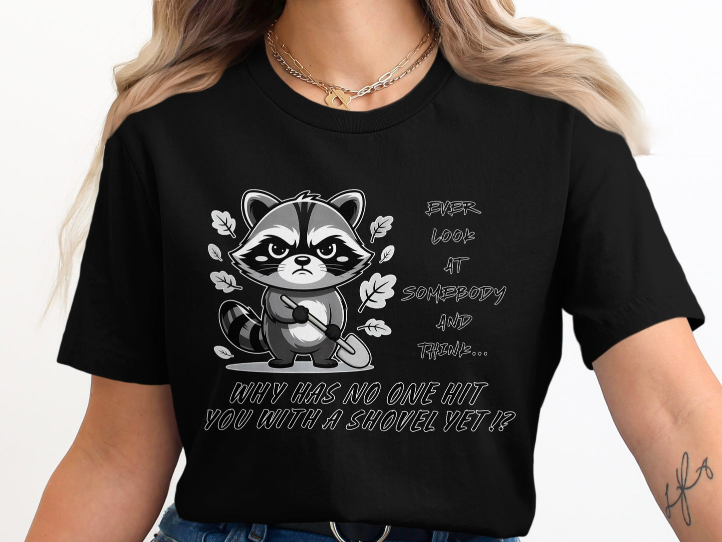 Black t-shirt with a grumpy raccoon holding a shovel and text.