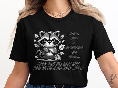 Black t-shirt with a grumpy raccoon holding a shovel and text.
