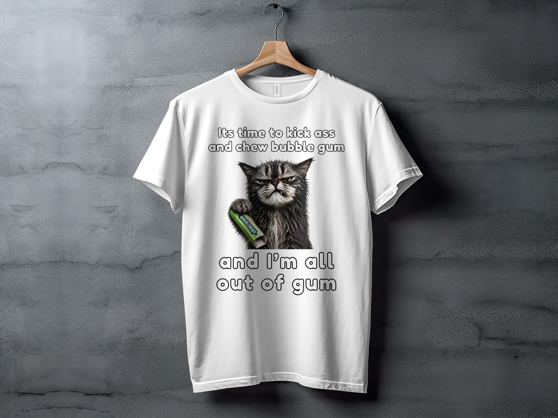 White t-shirt with a grumpy cat holding Doublemint gum and the text "It's time to kick ass and chew bubble gum and I'm all out of gum".