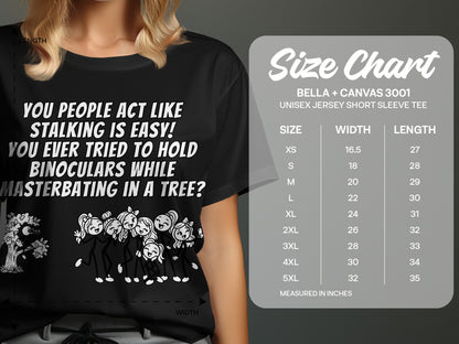 Black t-shirt with white text and stick figure graphic, alongside a size chart.