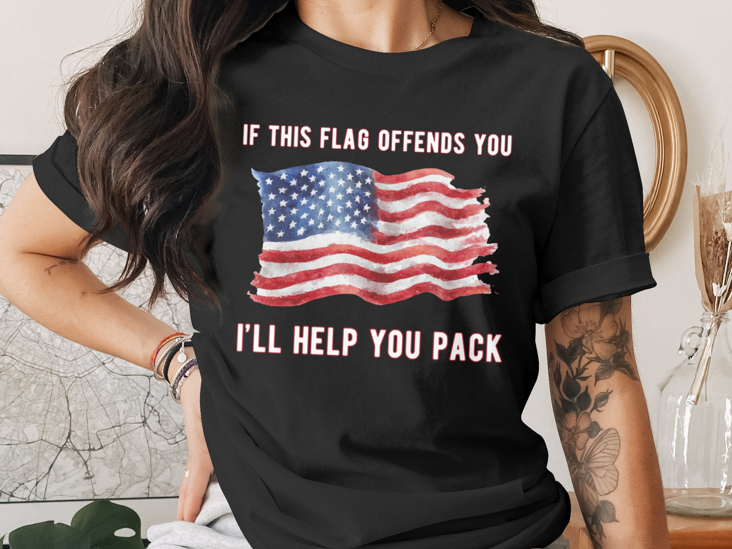 Black t-shirt with American flag and text "IF THIS FLAG OFFENDS YOU I'LL HELP YOU PACK."