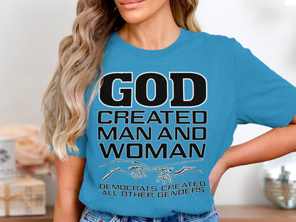 Turquoise t-shirt with text: GOD CREATED MAN AND WOMAN. DEMOCRATS CREATED ALL OTHER GENDERS.