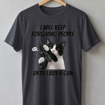 T-shirt with a black and white cat holding a gun and the text "I will keep forgiving people until I buy a gun."
