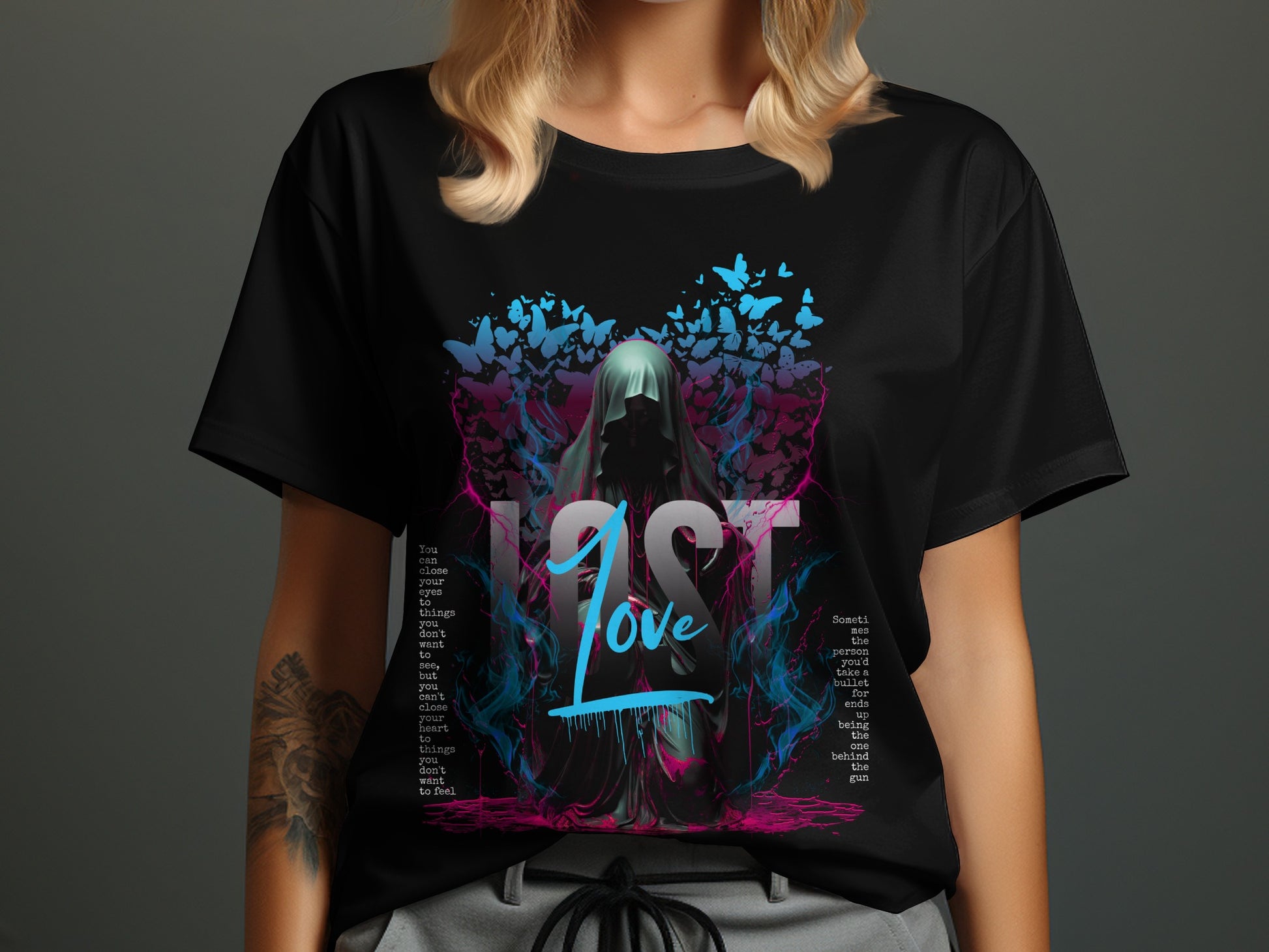 Black t-shirt with "Lost Love" graphic, a hooded figure, and text.