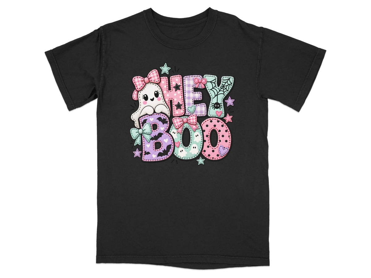 Black t-shirt with pastel "Hey Boo" Halloween graphic featuring a ghost and decorative lettering.