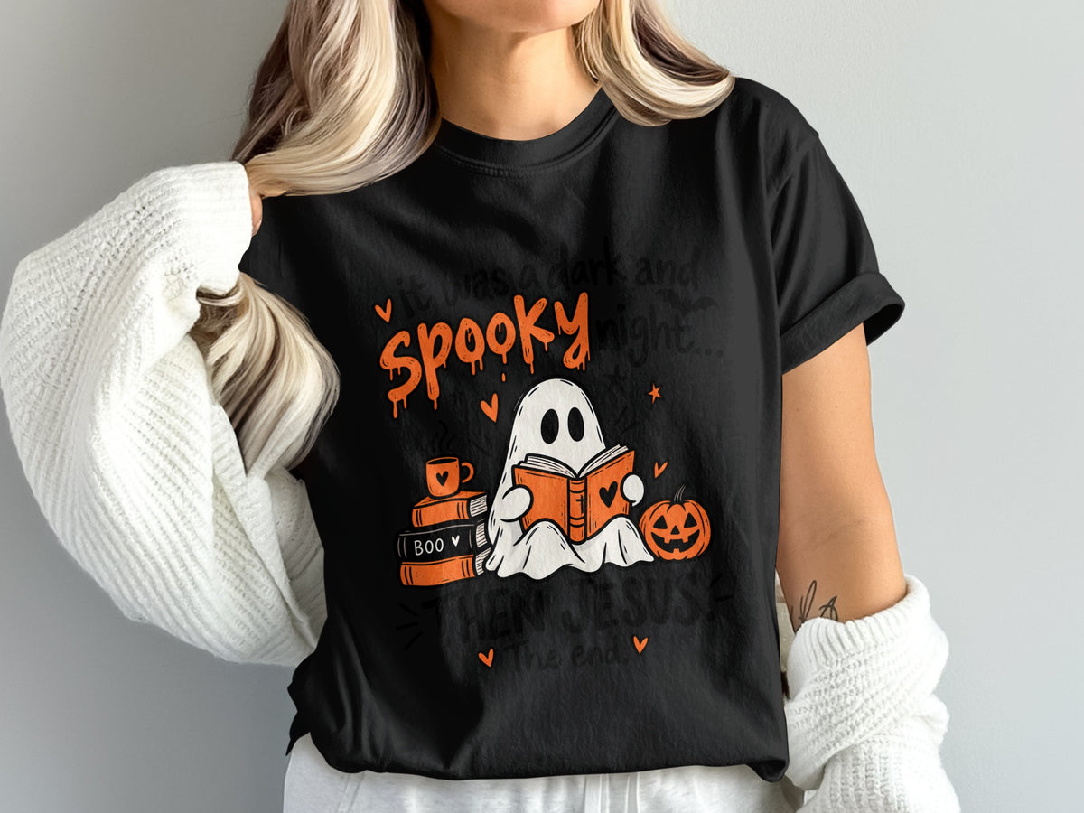 Black t-shirt with ghost reading a book, "Spooky" text, and pumpkins.