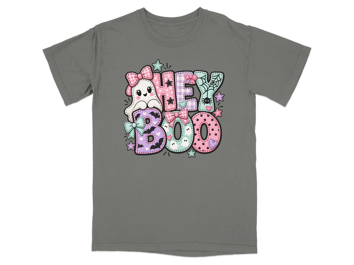 Ghost and pastel letter graphic on a grey t-shirt with text "HEY BOO".