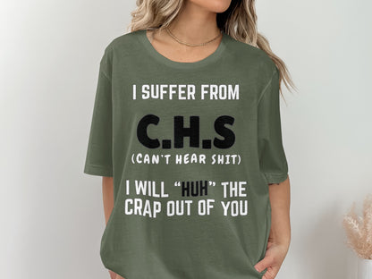 Olive green t-shirt with white text: "I SUFFER FROM C.H.S (CAN'T HEAR SHIT) I WILL 'HUH' THE CRAP OUT OF YOU"