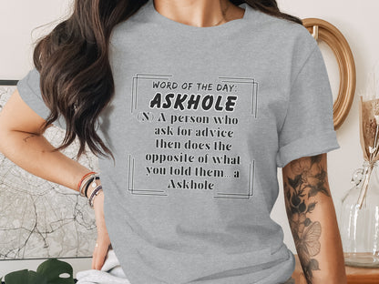 Grey t-shirt with text "Word of the day: Askhole (N) A person who ask for advice then does the opposite of what you told them... a Askhole".