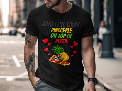Black t-shirt graphic: "Who else likes pineapple on top of pizza" with cartoon pineapple and pizza.