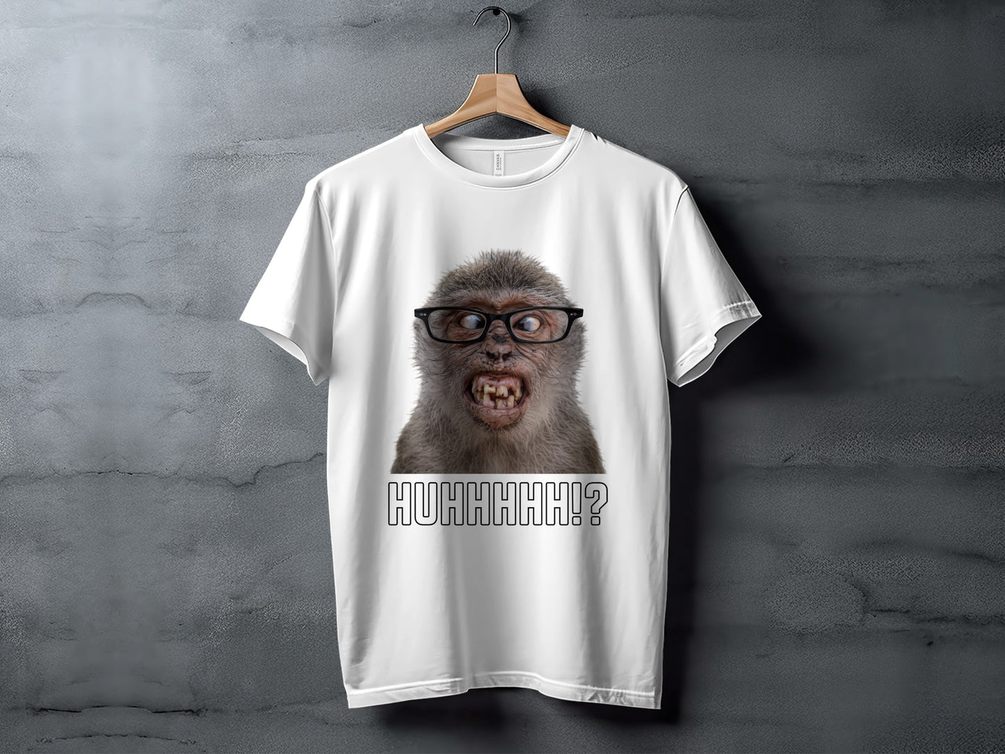 White t-shirt with a close-up of a surprised monkey wearing glasses and the text "HUHHHHH!?".
