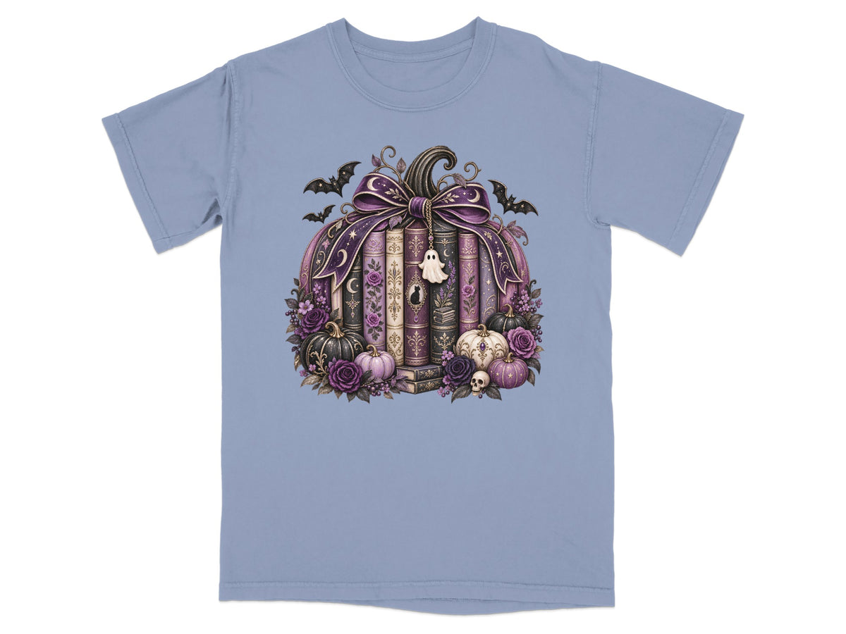 Book pumpkin design with bats, ghost, skulls, roses, and small pumpkins.