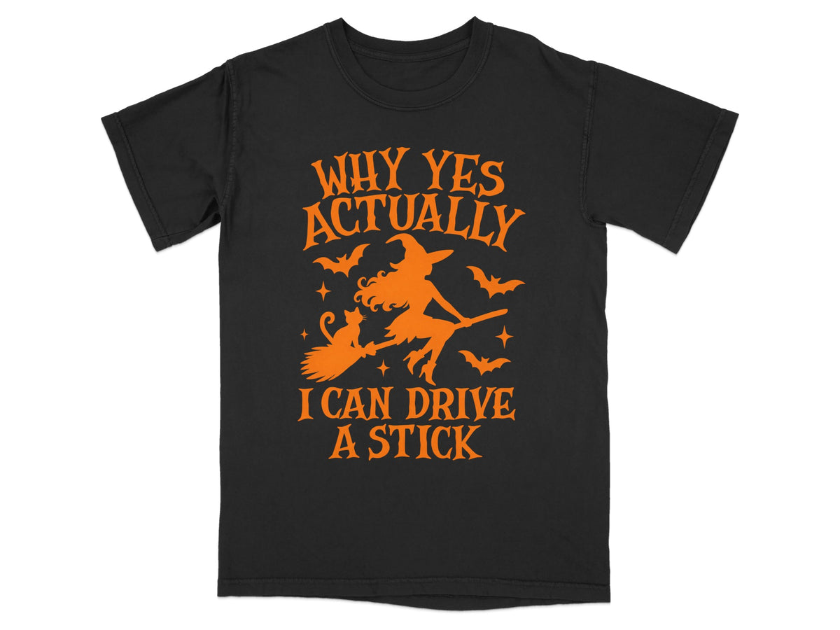 Black t-shirt with orange text and Halloween graphic of a witch and cat flying on a broomstick.
