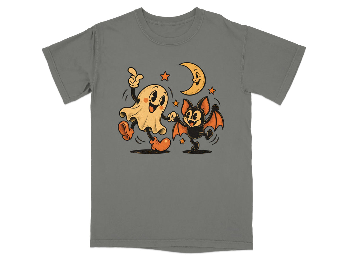 Retro cartoon ghost and bat dancing under a crescent moon.