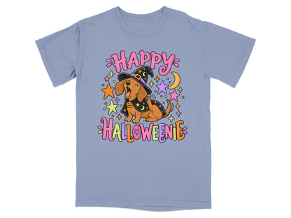 Dachshund in witch hat with "Happy Halloweenie" text surrounded by stars.