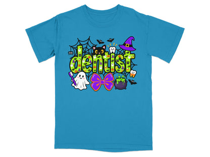 Bright blue short-sleeve t-shirt with a green graphic featuring the word dentist surrounded by Halloween icons.