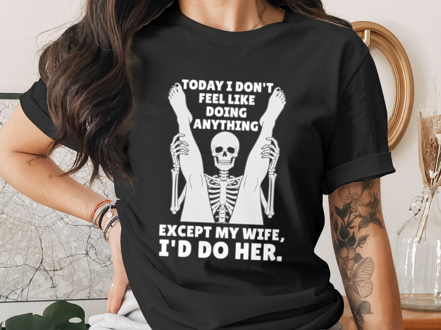 Black t-shirt with skeleton graphic and text "Today I don't feel like doing anything except my wife, I'd do her."