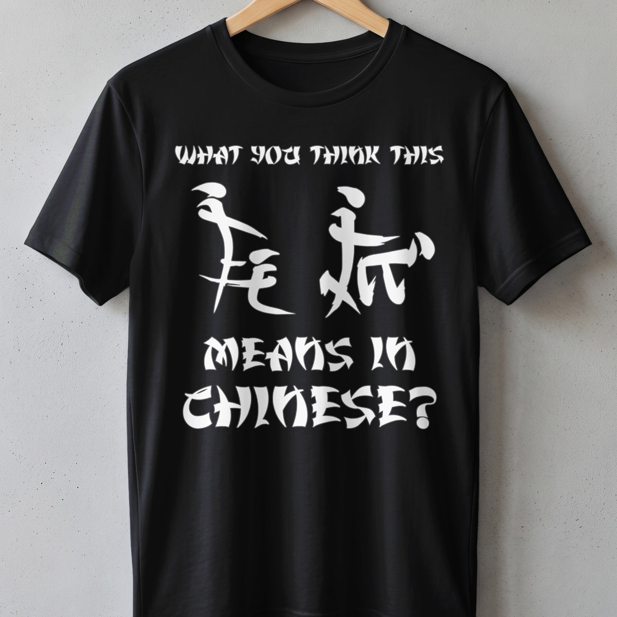 Black t-shirt with white text asking "What you think this means in Chinese?"
