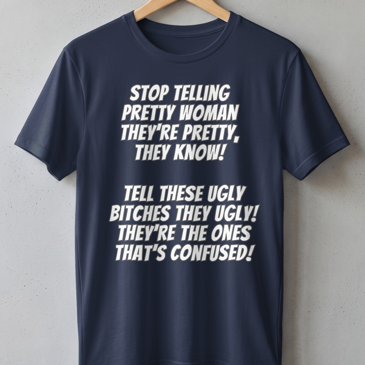 Navy t-shirt with white text: "Stop telling pretty women they're pretty, they know!"