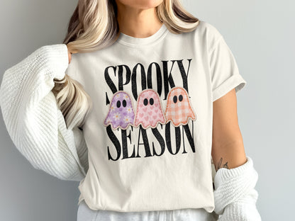 White t-shirt with "SPOOKY SEASON" text and three embroidered ghosts.