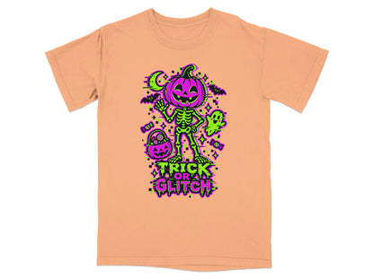Orange t-shirt with "Trick or Glitch" Halloween graphic featuring skeleton, pumpkin, and ghost.