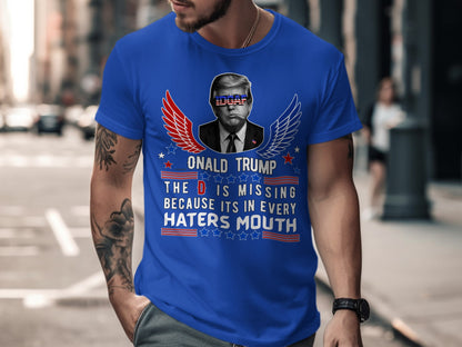 Blue t-shirt with Donald Trump graphic and text "The D is missing because its in every haters mouth".
