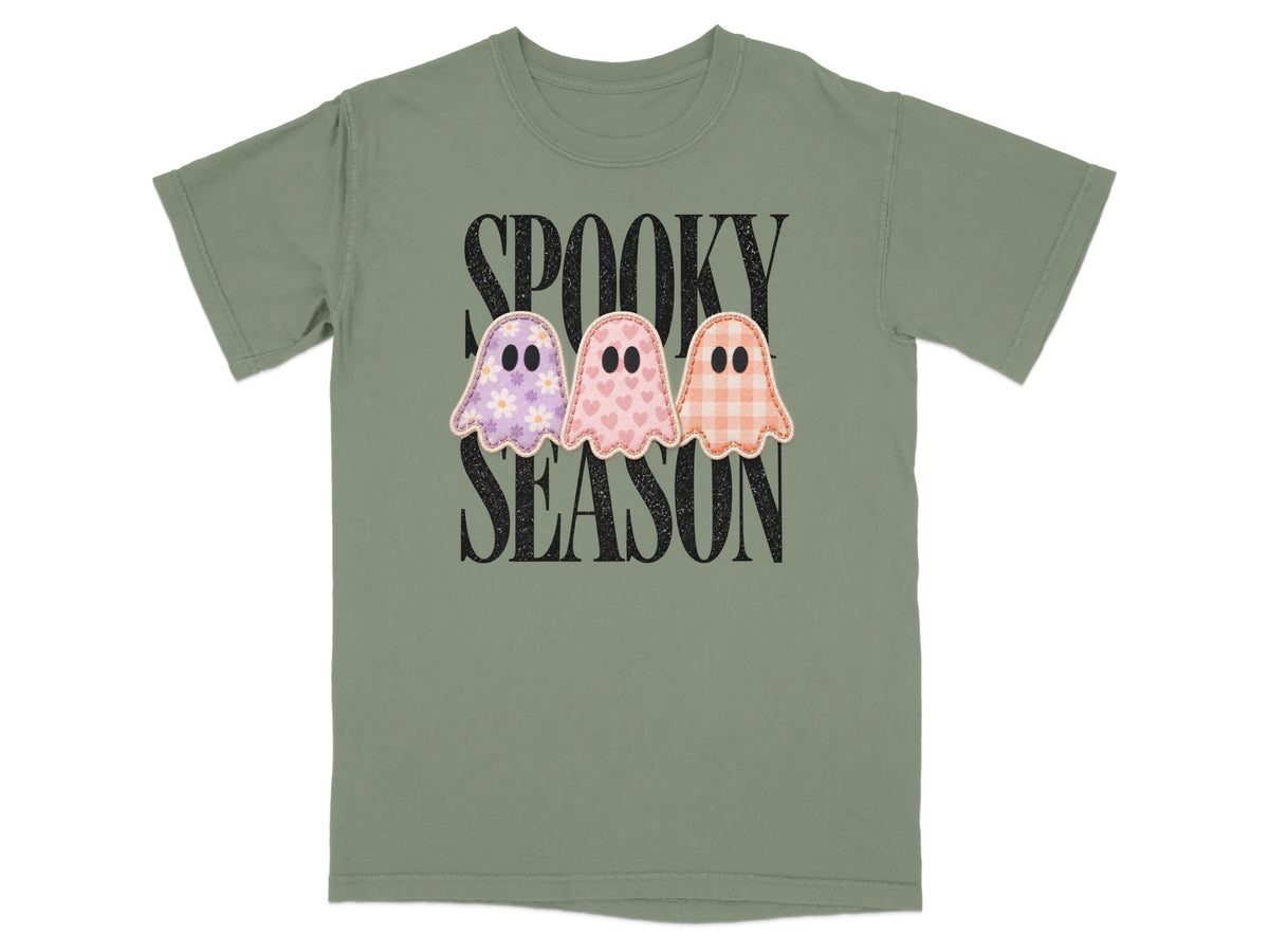 Green t-shirt with "Spooky Season" text and three patterned ghosts.
