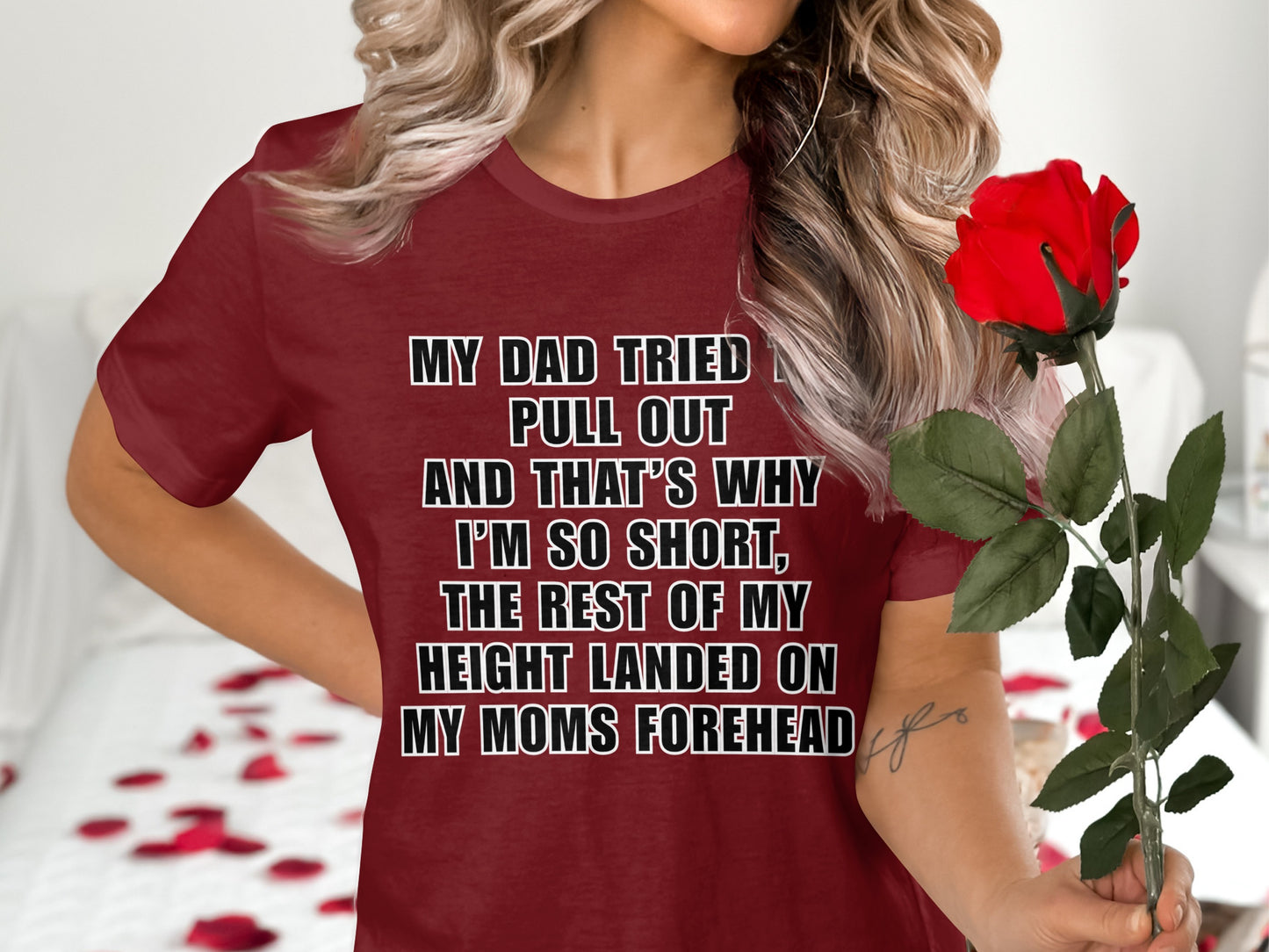 Maroon t-shirt with text: My dad tried to pull out, and that's why I'm so short.