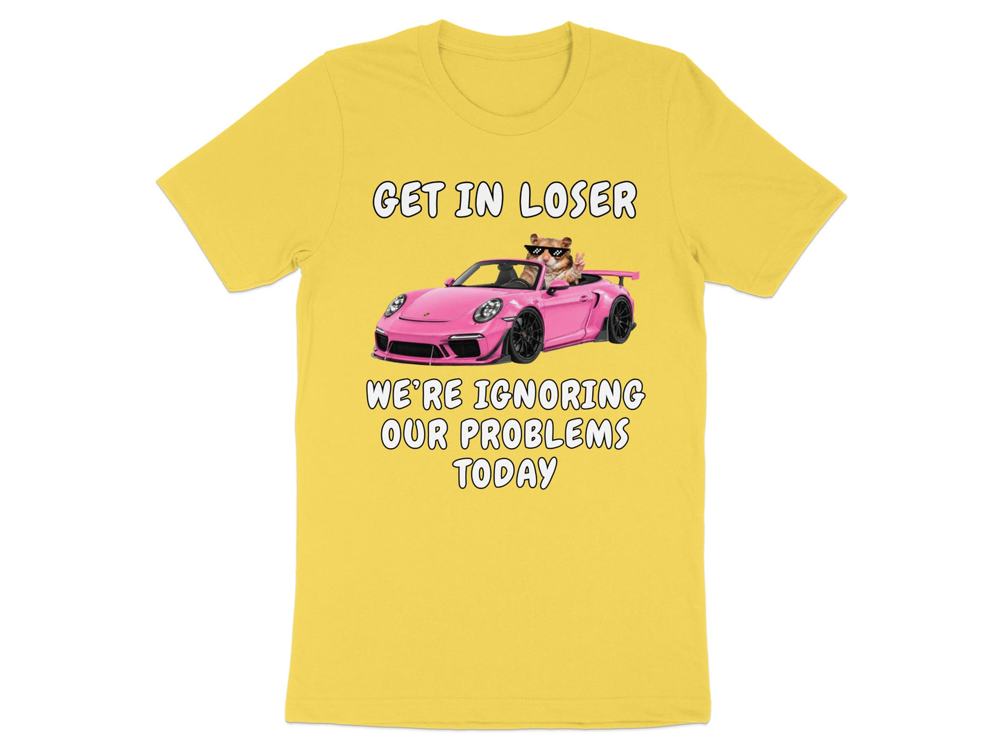 Yellow t-shirt with cartoon cat in sunglasses driving a pink convertible, text "GET IN LOSER WE'RE IGNORING OUR PROBLEMS TODAY"