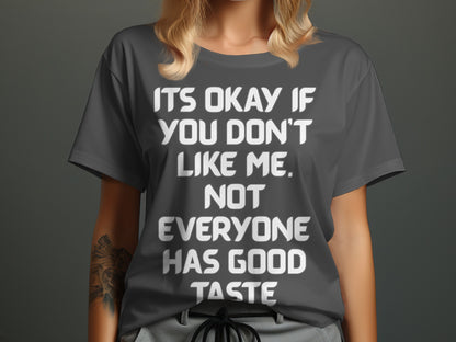 Gray t-shirt with white text: "It's okay if you don't like me. Not everyone has good taste."