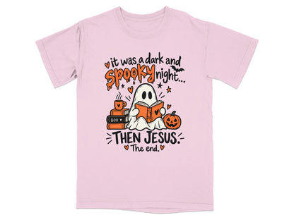 Pink t-shirt with a ghost reading a book and text: "it was a dark and spooky night... THEN JESUS. The end."