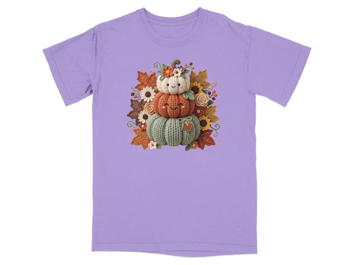 T-shirt with stacked knit pumpkins and autumn leaves graphic.