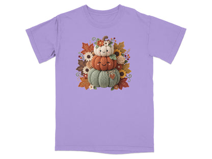T-shirt with stacked knit pumpkins and autumn leaves graphic.