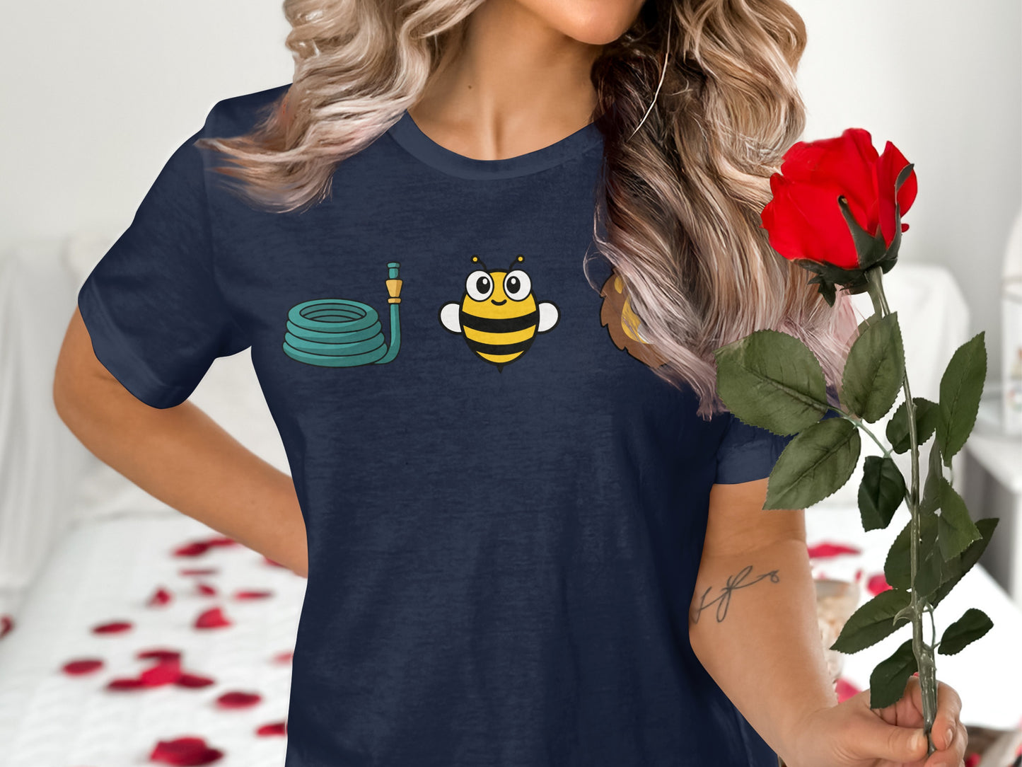 Navy t-shirt with a cartoon hose, bee, and a rose.