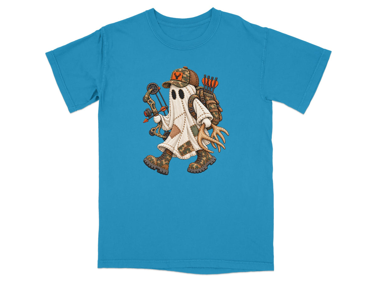 Bright blue short-sleeved t-shirt featuring a cartoon ghost dressed as a hunter with a bow, backpack, and antlers.