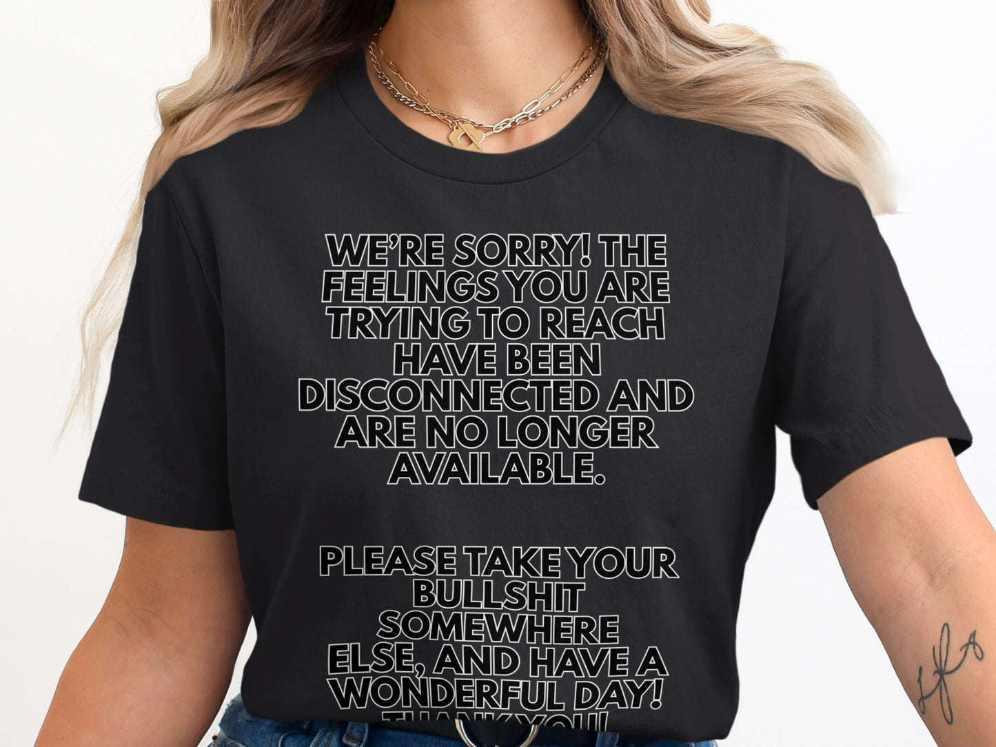 Black t-shirt with white text: "We're sorry! The feelings you are trying to reach have been disconnected..."