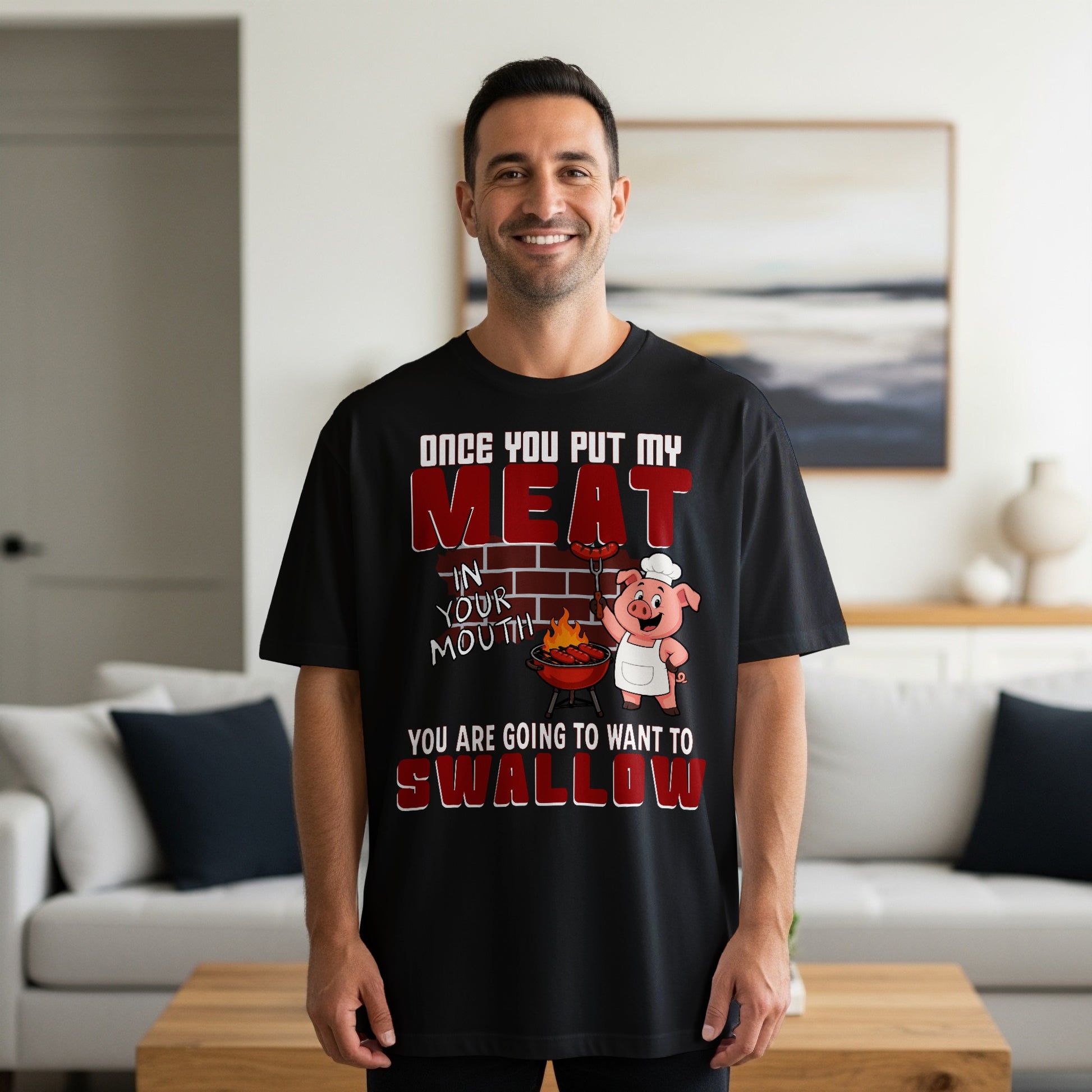 Black t-shirt with text and cartoon pig grilling meat, "Once you put my meat in your mouth".