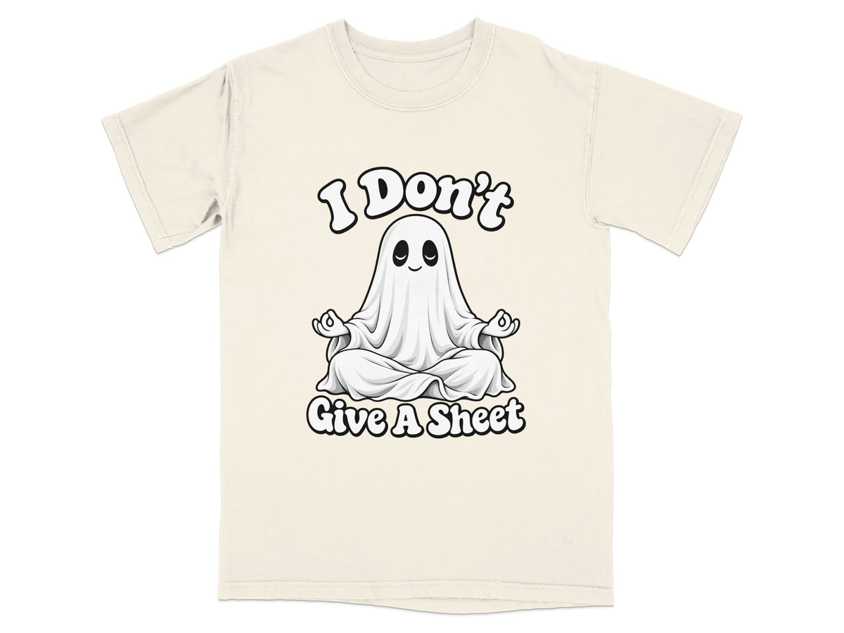 Cream t-shirt with graphic of a ghost meditating and text "I Don't Give A Sheet".