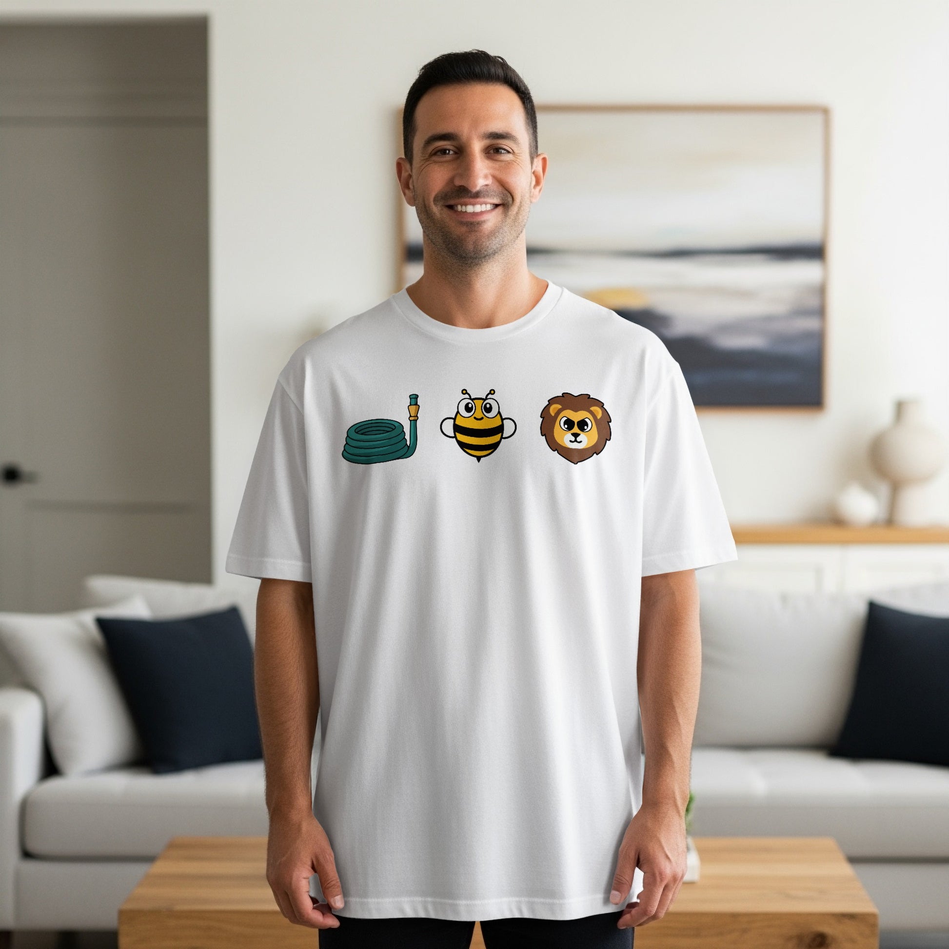 White t-shirt with cartoon hose, bee, and lion graphics.