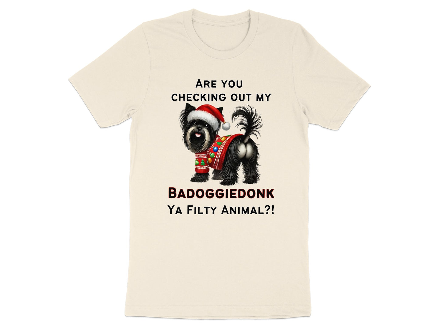 Cream t-shirt with text and a black dog wearing a Santa hat and sweater.