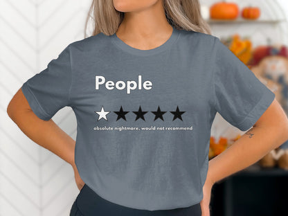 Grey t-shirt with "People" and one star rating with text "absolute nightmare, would not recommend".