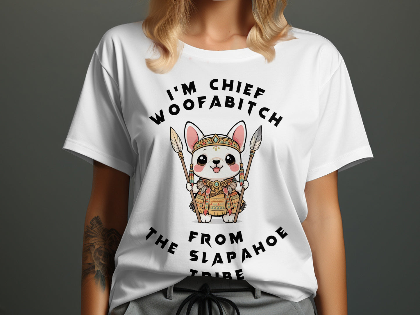 White t-shirt with cartoon dog graphic saying "I'M CHIEF WOOFABITCH FROM THE SLAPAHОЕ TRIBE".