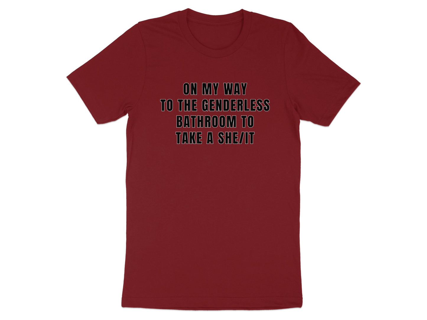 Maroon t-shirt with text "ON MY WAY TO THE GENDERLESS BATHROOM TO TAKE A SHE/IT".